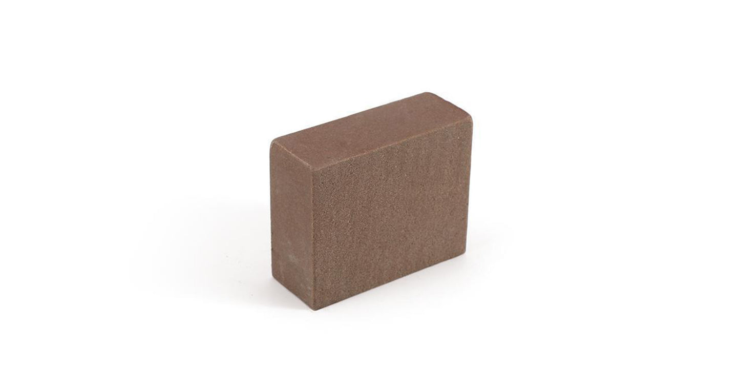 Gummiblock för rengörning av bana