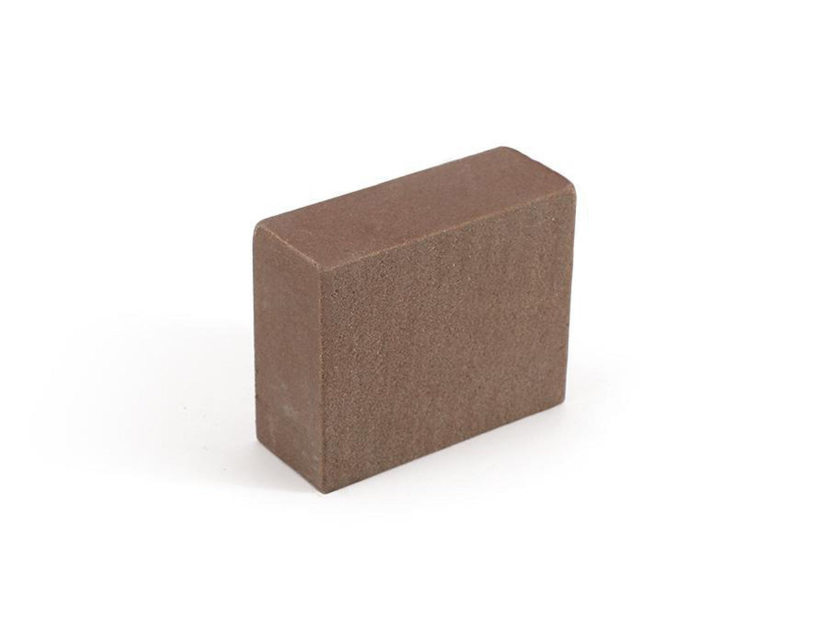 Gummiblock för rengörning av bana